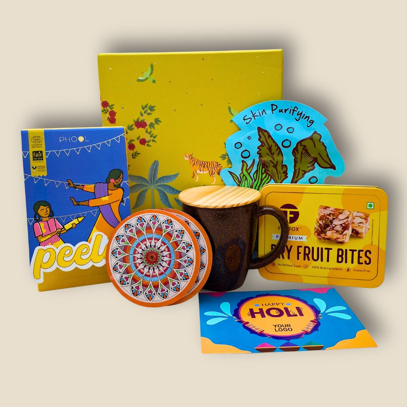 Collection of items including a mug, snacks, and decorative cards on a beige background